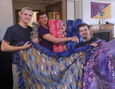 Lawrence Delts Donate Handmade Blankets to Hospital