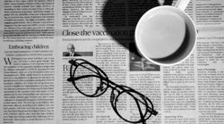 newspaper glasses