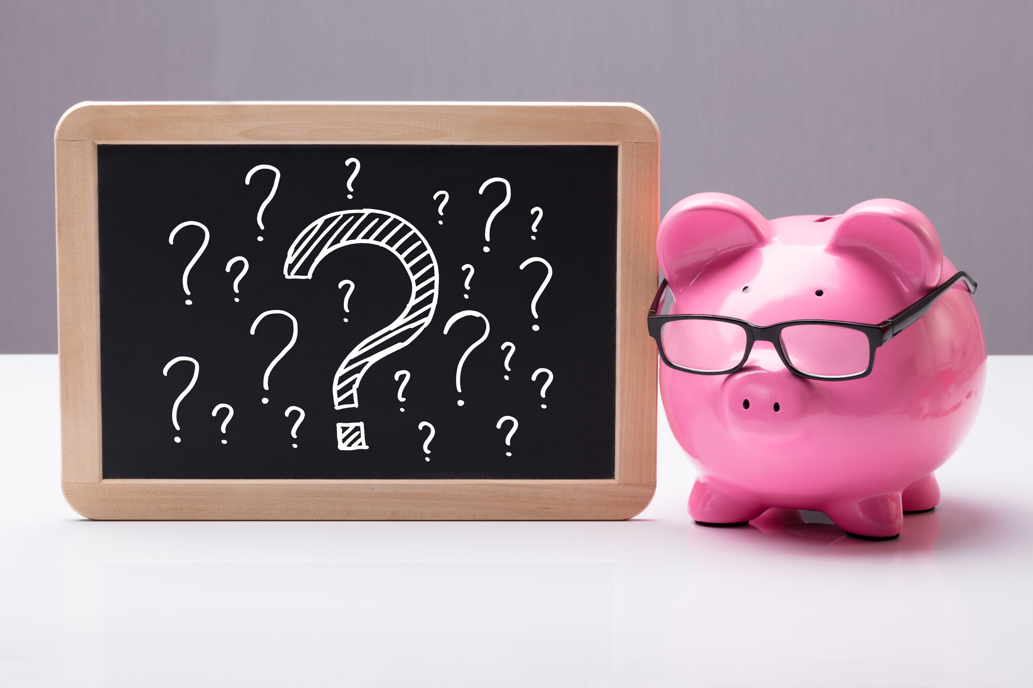 Piggy Bank  with small Chalkboard featuring question marks in chalk of different sizes