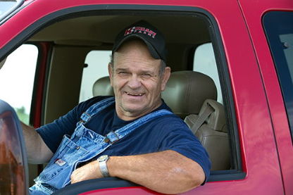 Merrill in his red truck