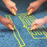 Child hands drawing a door with sidewalk chalk Child hands drawing a door with sidewalk chalk