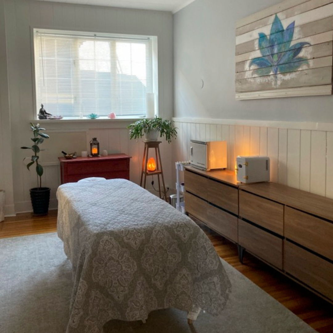 treatment room with massage table