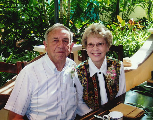 Louis and Norma Swenke sitting in a garden