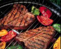 Dougherty Farm Fresh Beef steaks on a grill