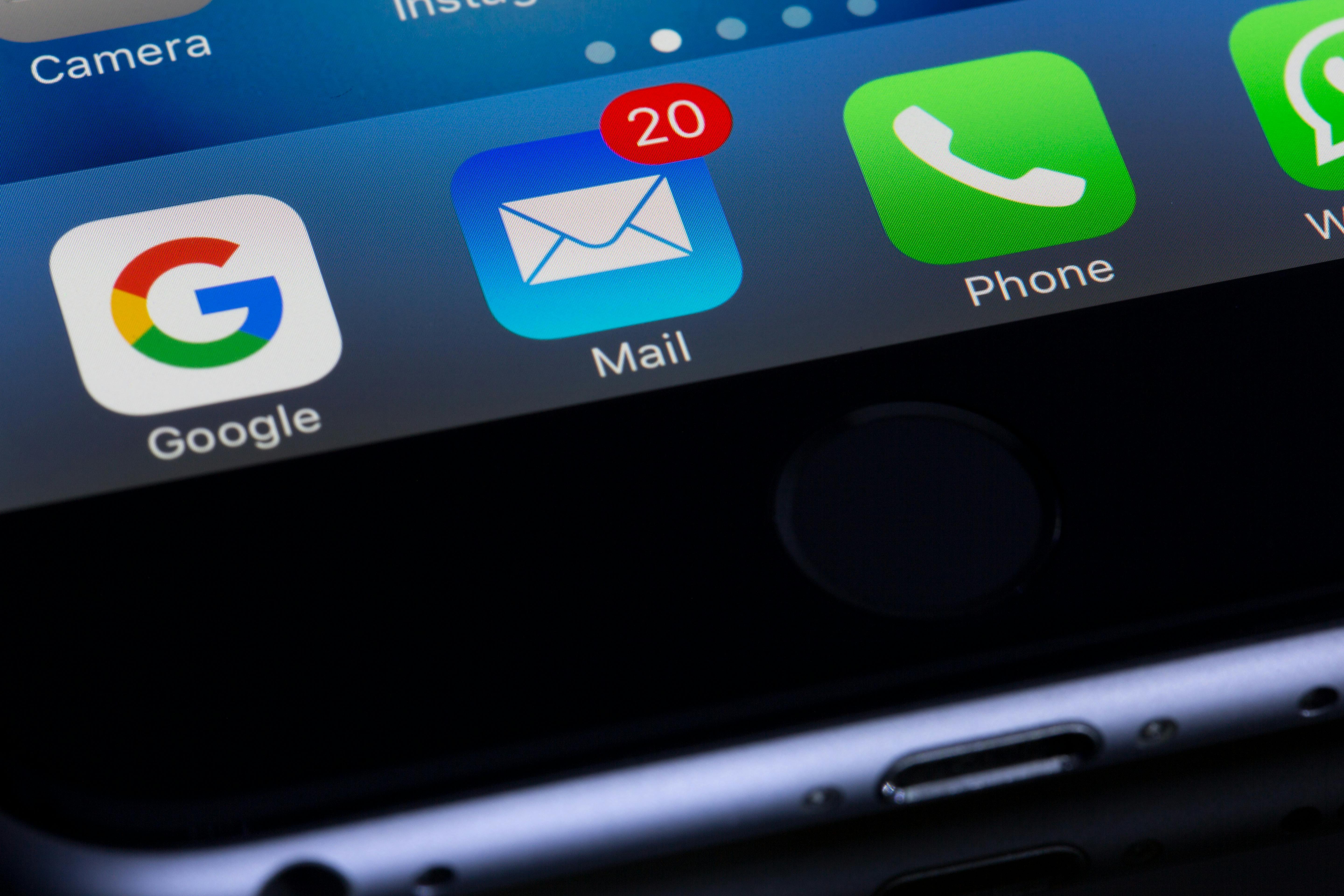 a smartphone with unread email alerts