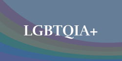 LGBTQIA+ words over a blue background with red, orange, yellow, green, blue, and purple color stripes