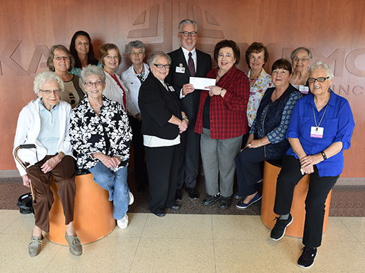 DeKalb Memorial Hospital Fundraising Guild presents check to Dekalb Health leadership