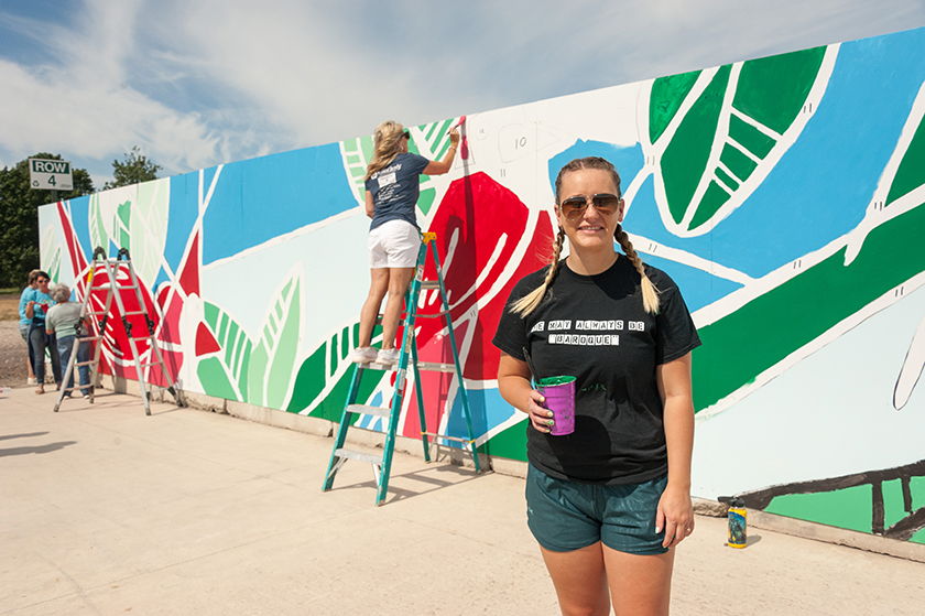 Artish Leah Pinney at mural painting day