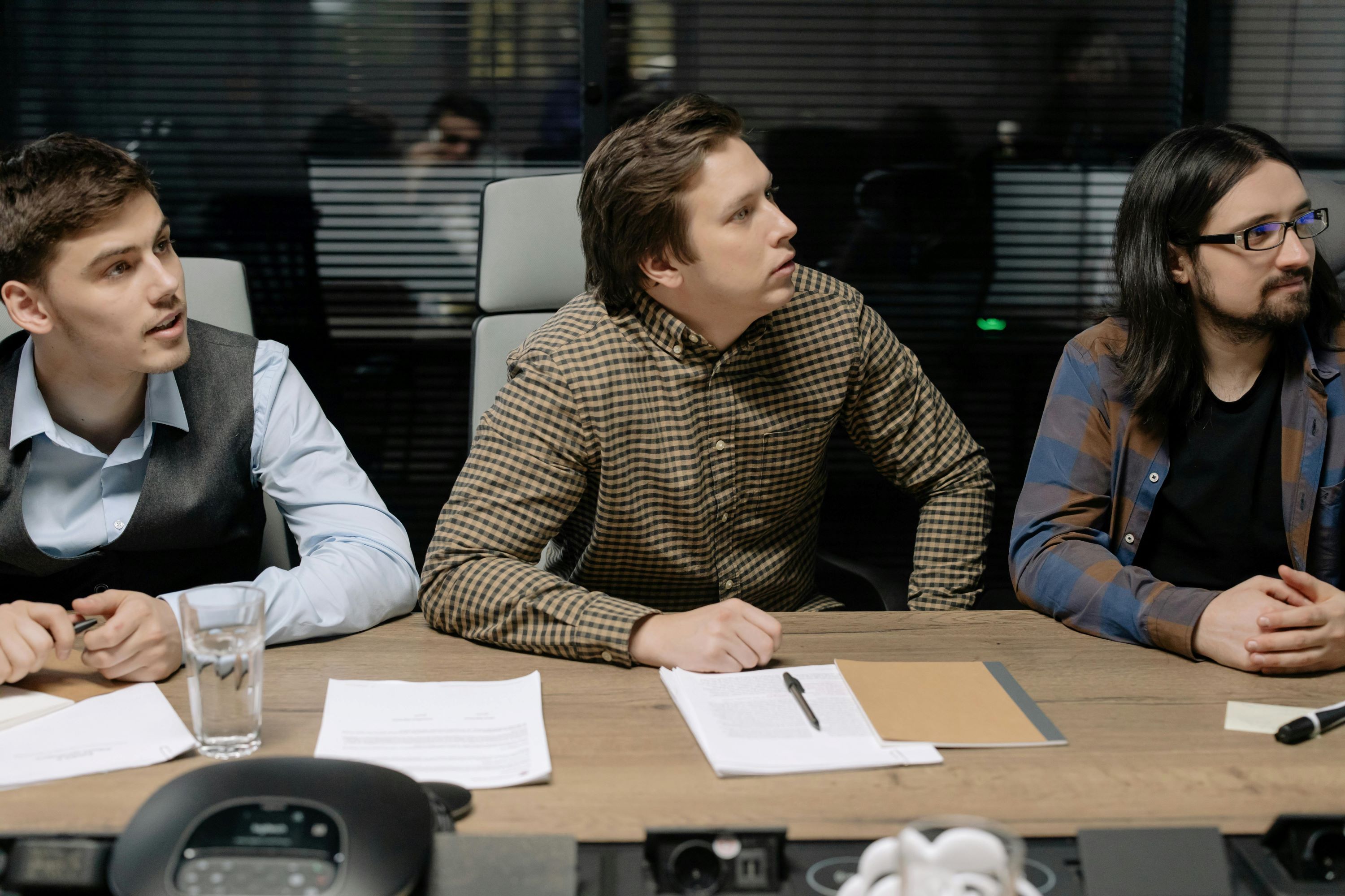 young men in boardroom young men in boardroom