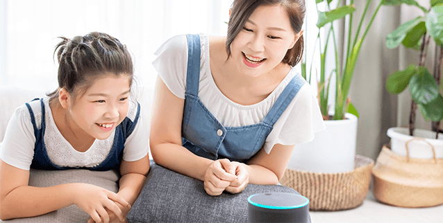 iPay Quickpay Women and daughter speaking to smart speaker