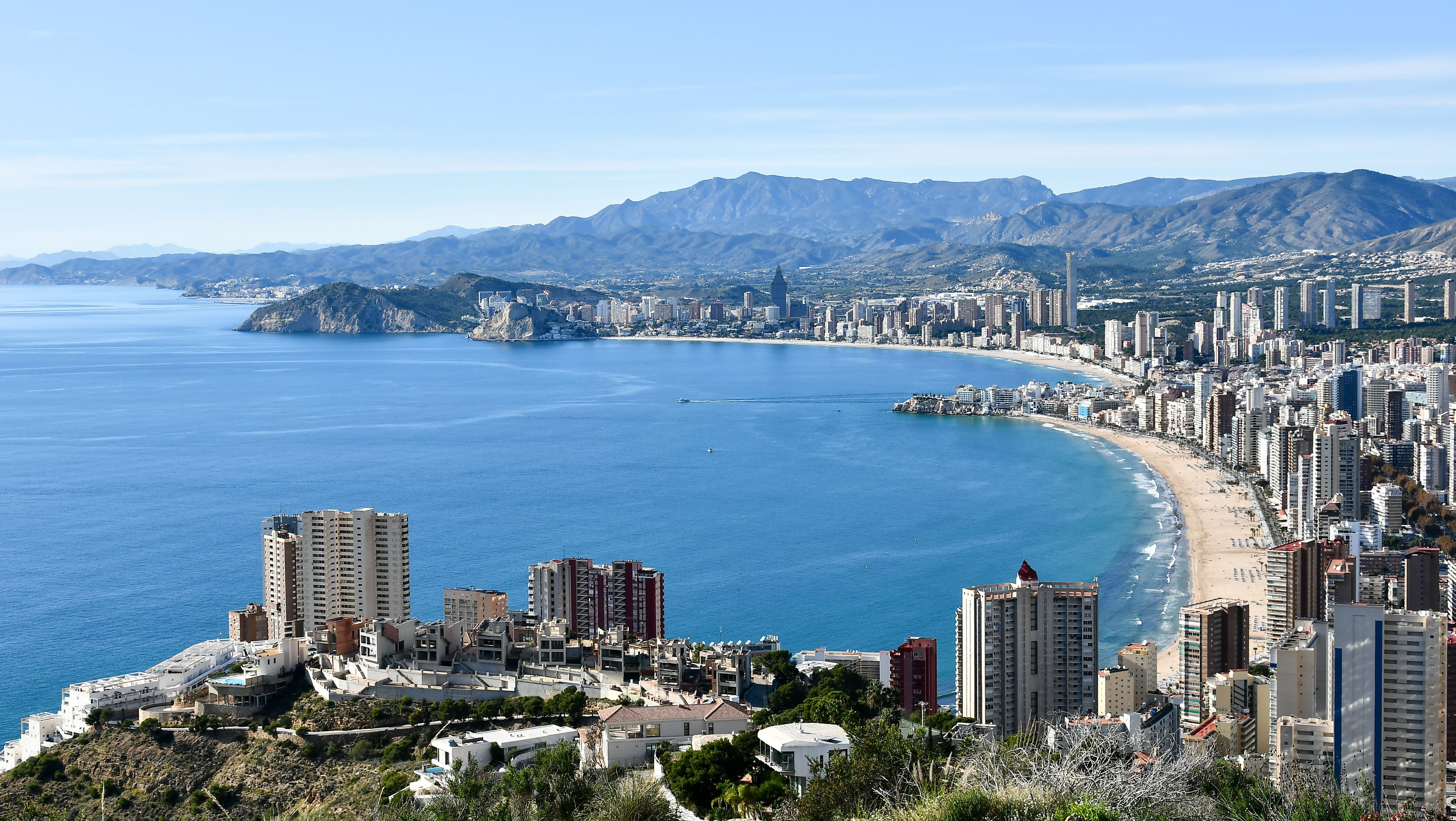 Aerial view showing the beautiful skyline and coast of Benidorm, Spain.