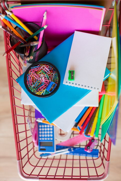 School supplies in shopping cart