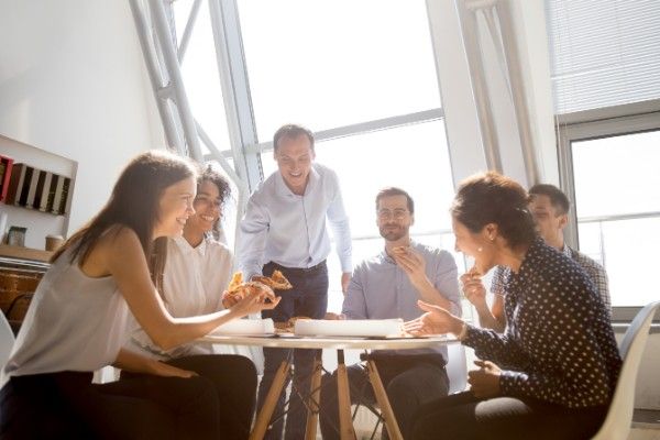 Group of people at an office table Group of people at an office table