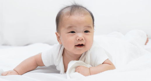 Infant wearing white