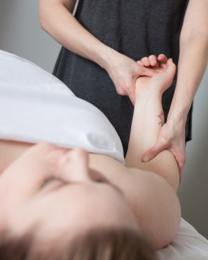 white woman receiving arm massage