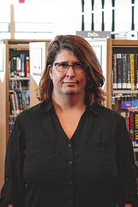Adult Services Librarian Jenelle Erickson-Bejarano in black shirt