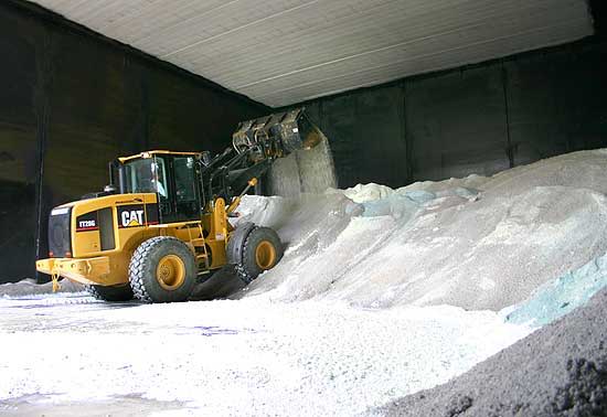 CAT removing snow