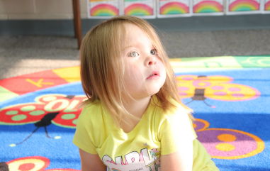 Curious baby yellow shirt