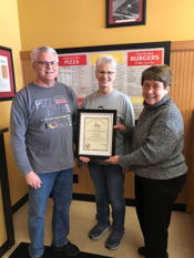 Leising congratulates Pizza Haus for 50 years of business