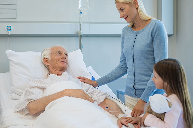 grandpa with daughter and granddaughter in hospital