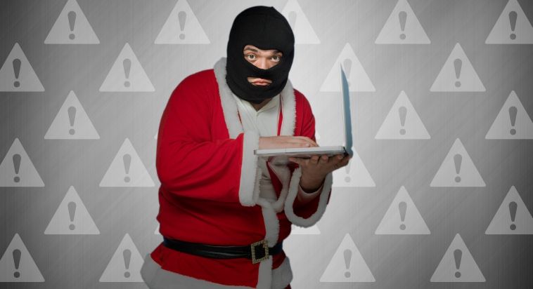 computer criminal dressed as Santa