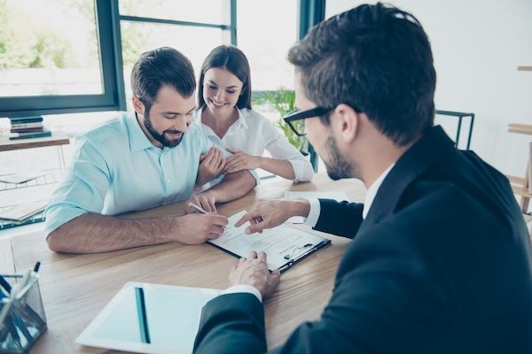 attorney consulting young couple