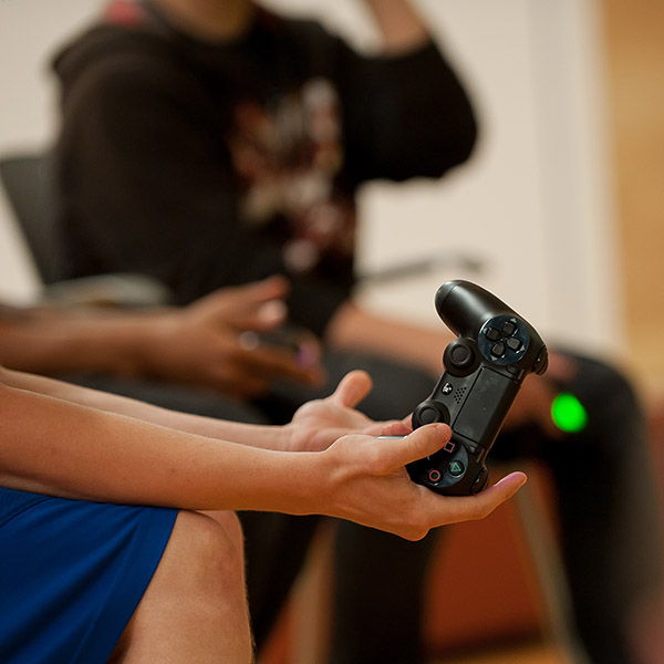 Video Games Image of person holding a video game controller
