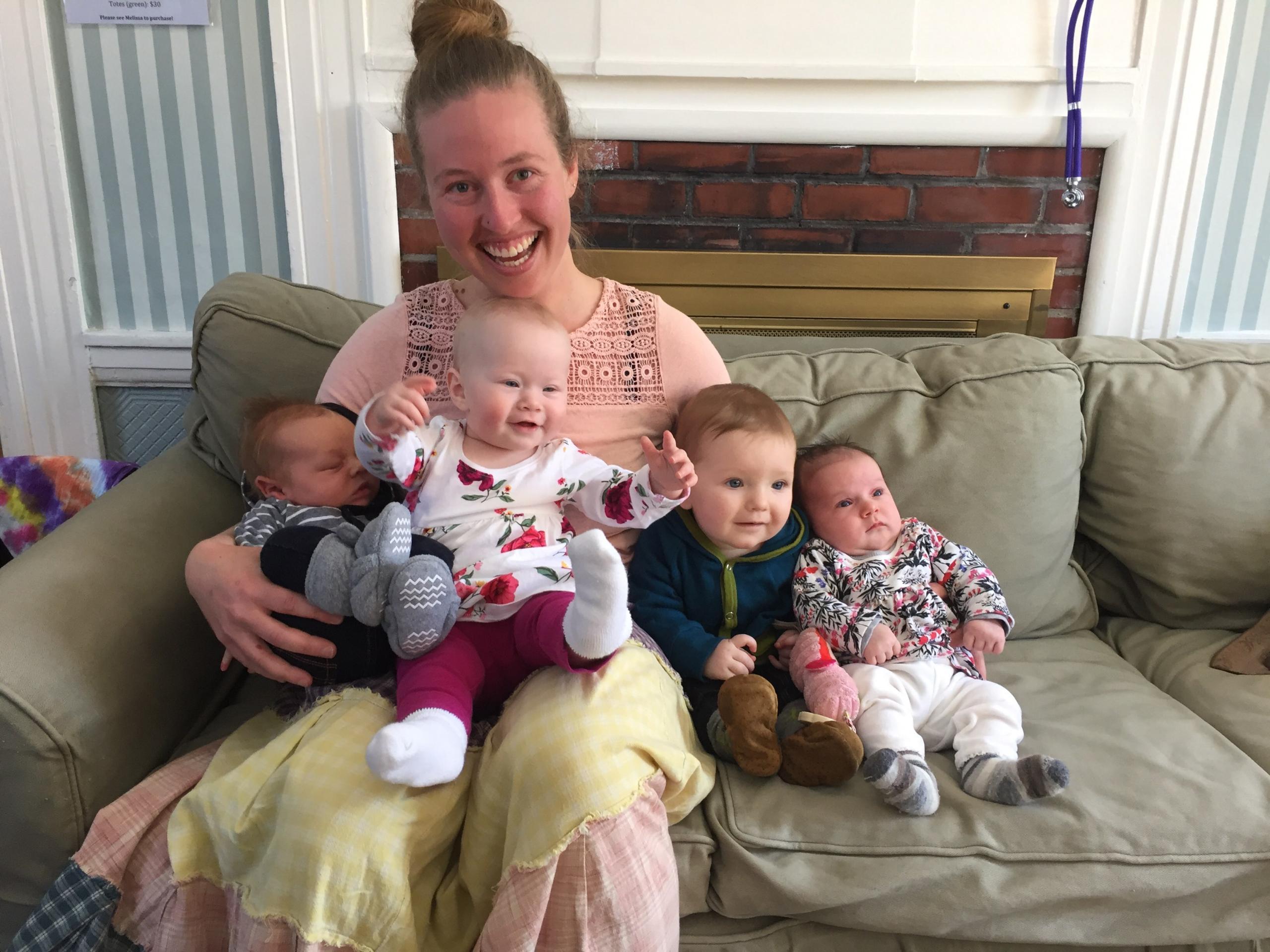 Midwife Acadia, sitting couch with 4 babies