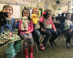 Mrs. Cantwell's class plays with puppets Mrs. Cantwell's class plays with puppets
