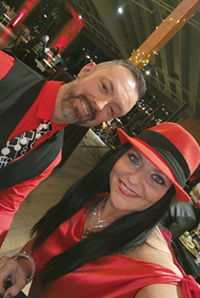 Kelly Ellis and Joshua Pennebaker, dancers costumed ined outfits