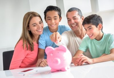 Family deciding what type of savings account to use for their kids future Family deciding what type of savings account to use for their kids future