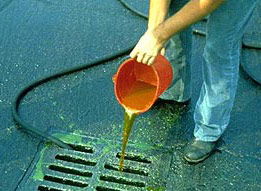 Storm drain dumping image Storm drain dumping image