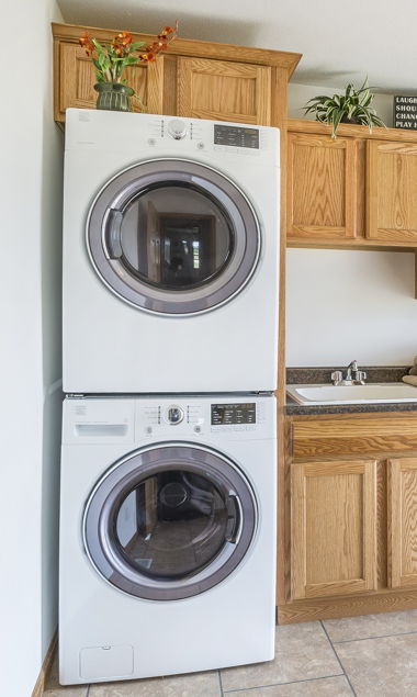 ENCLOSED STACKED WASHER AND DRYER
