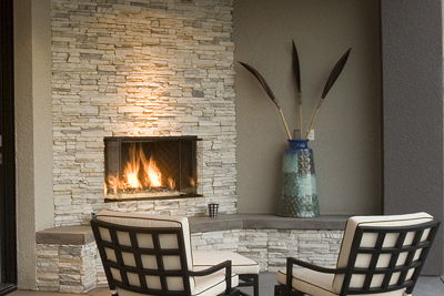 outdoor fireplace with patio furniture