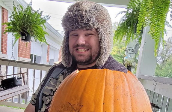 photo of Chris with pumpkin
