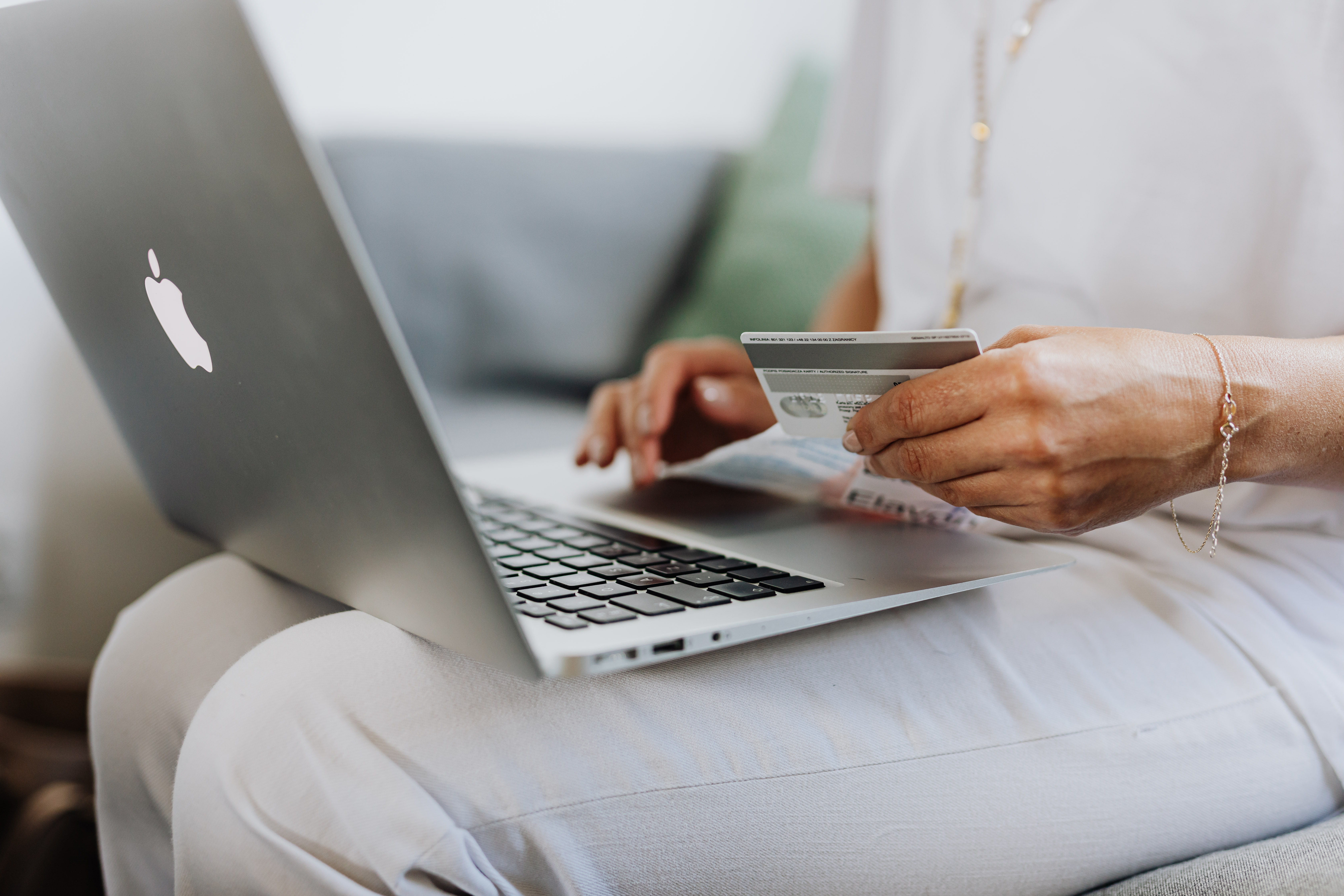 Courtesy of karolina-grabowska from pexels Woman on computer looking to enter her credit card number