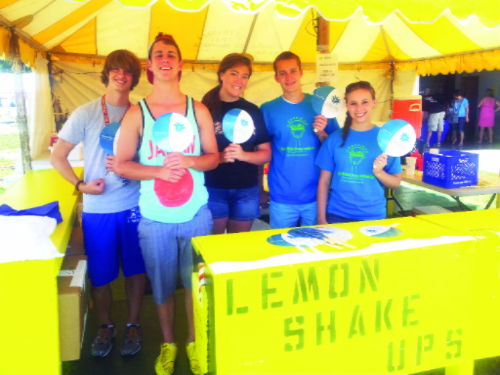 Youth philanthropy volunteering at the fair
