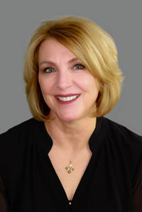 author Susan Crandall in black shirt with necklace