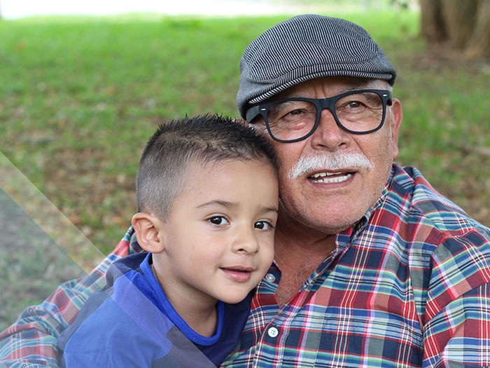 Grandpa and grandson in park