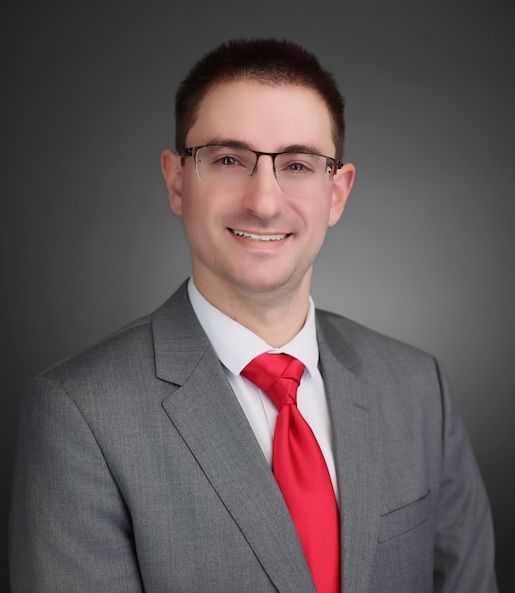 alex coats headshot
